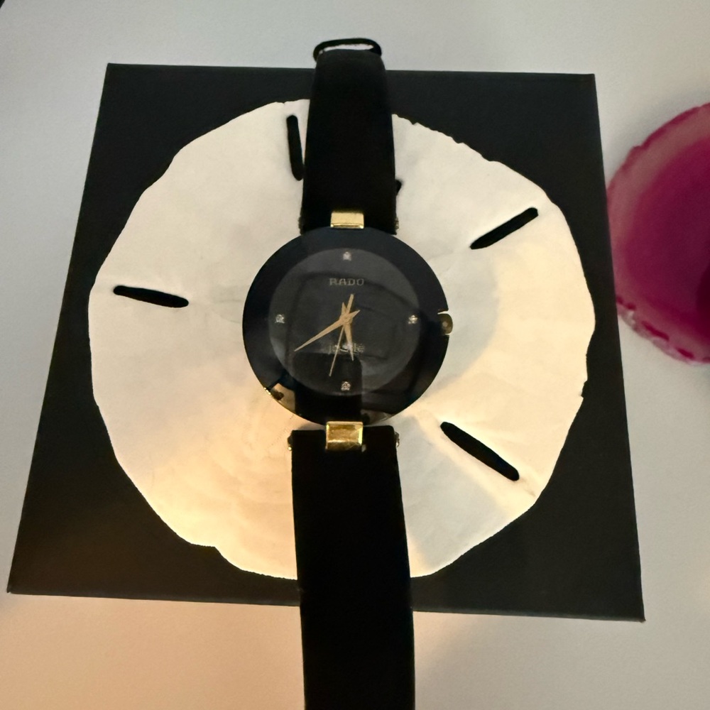 RADO 4P Diamond black dial date, quartz men’s watch with black suede band.